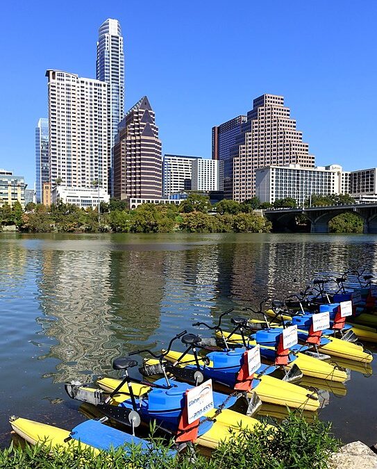 Yellow paddle boats on Ladybird Lake in Austin, TX